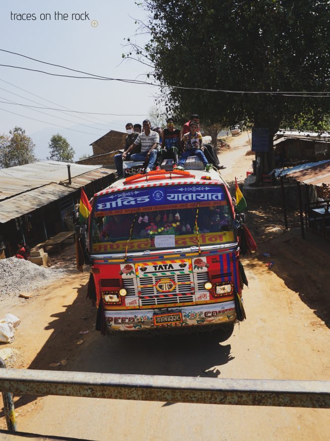 Manaslu Trek - Arriving at Arketh Bazaar by bus while sitting on the rooftop Manaslu Trek - Arriving at Arketh Bazaar by bus while sitting on the rooftop