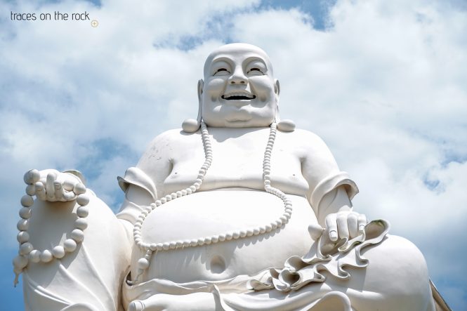 Laughing Buddha at Vinh Trang Temple Laughing Buddha at Vinh Trang Temple
